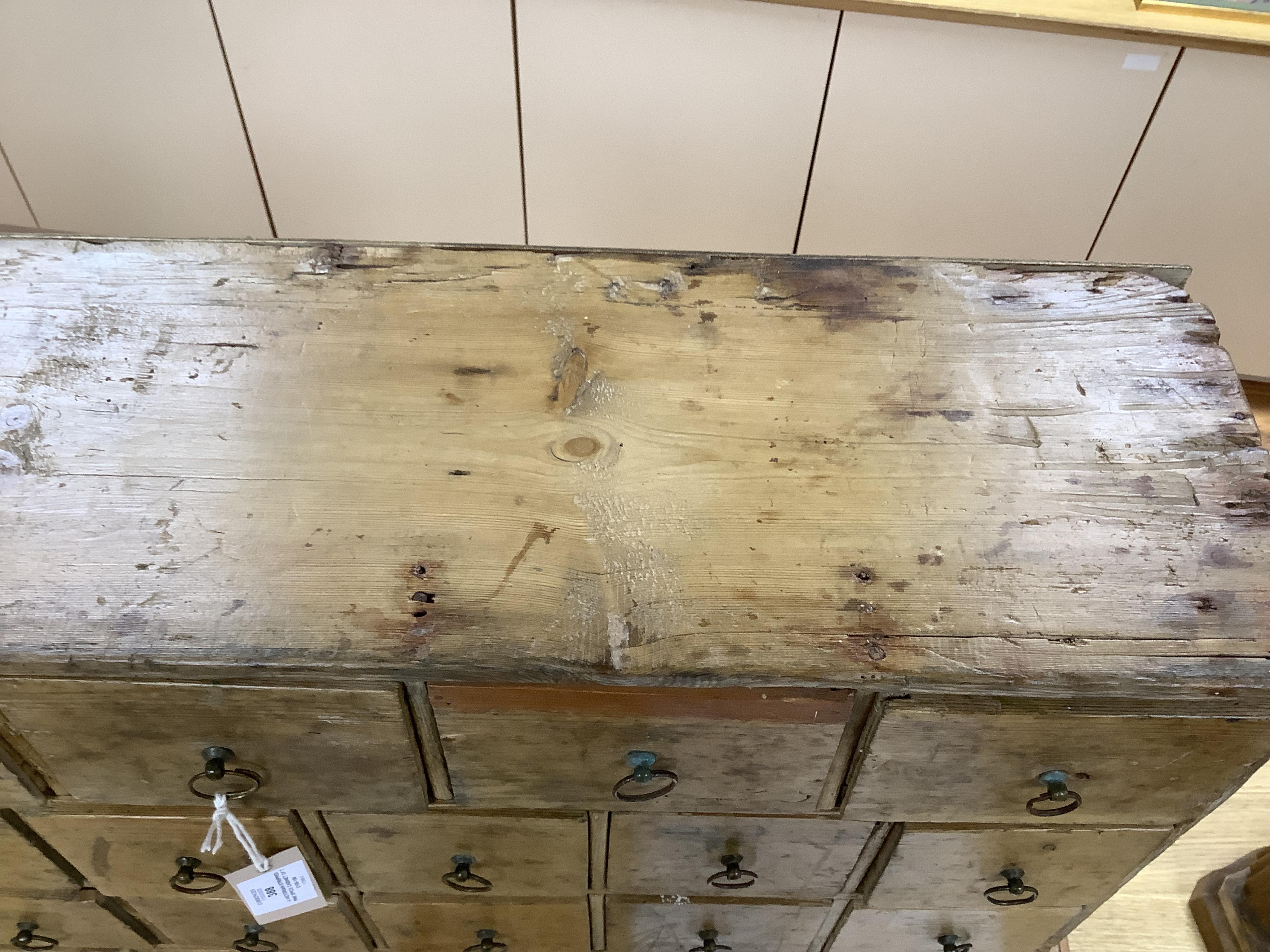 A Victorian stripped pine spice cabinet of twenty six drawers, 68cm wide x 63cm high x 22cm deep. Condition - fair to good